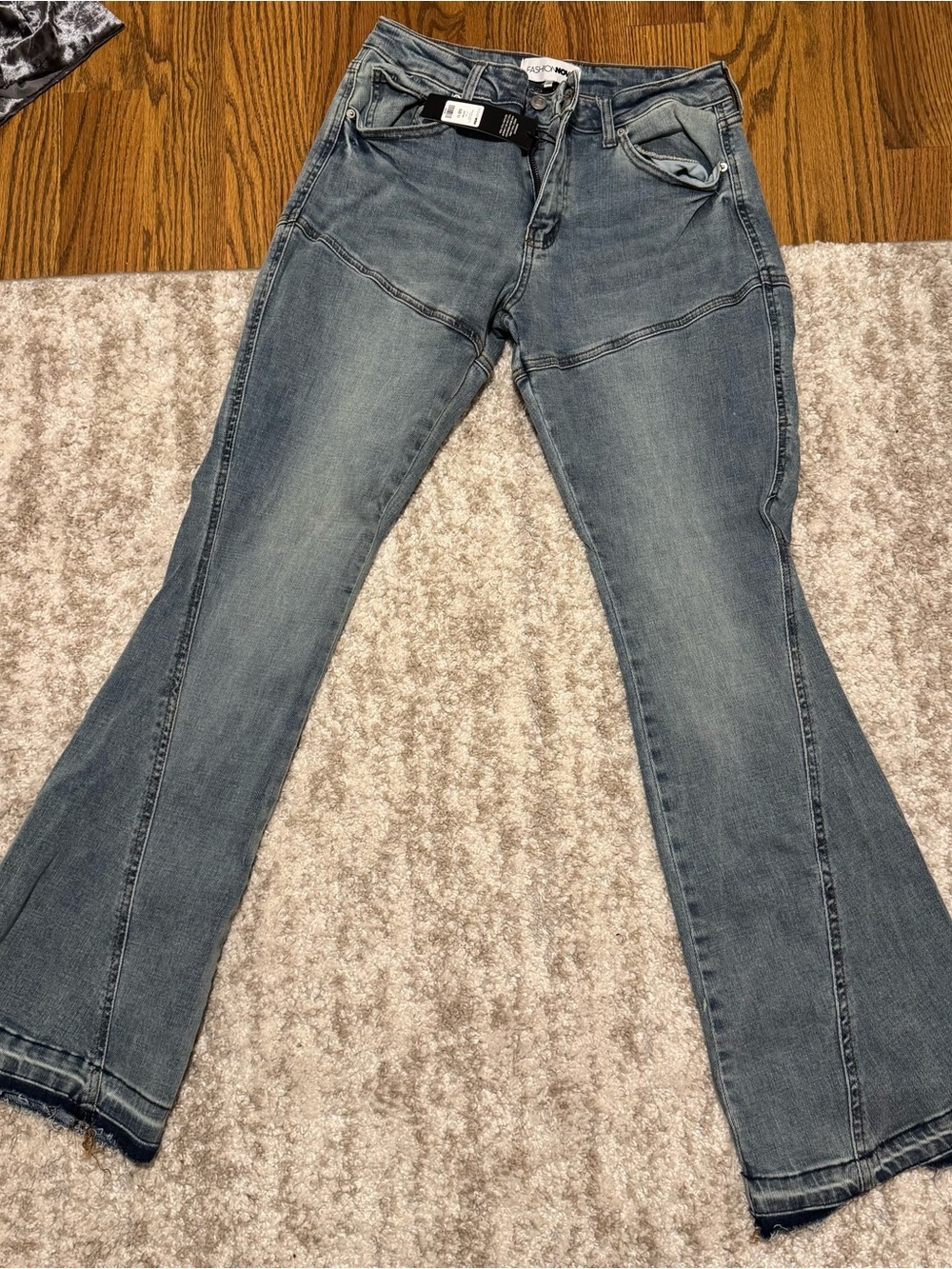 Fashion Nova Mid-Rise Flare Jeans in Light Blue